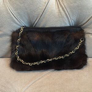 Elegant Black Fur Clutch with Gold Chain
